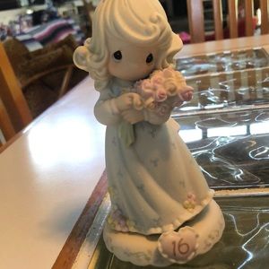 Vintage pastel color Precious Moments. “Sweet 16” c.1994. Approximately 7 x 3”.